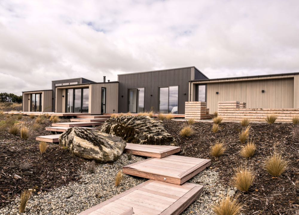 Alaskan Yellow Cedar cladding & Purpleheart decking featured at "Rocky Ridge" home in Te Anau. Designed & Built by Fabric & Te Anau Ltd. Image by Stephen Goodenough Photography.