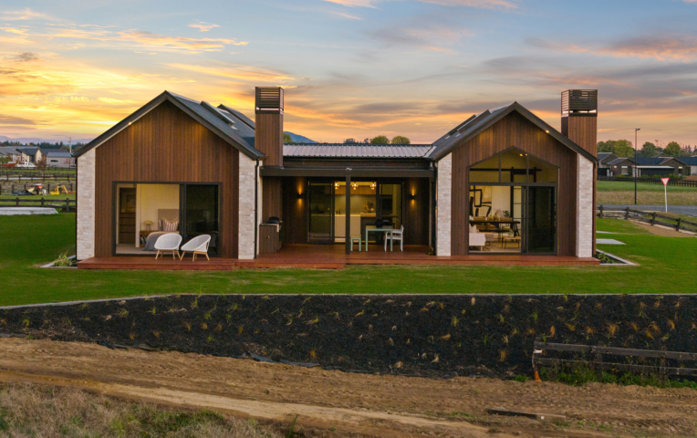 Exterior cladding in TMT Taxon and Canyon Clay coating