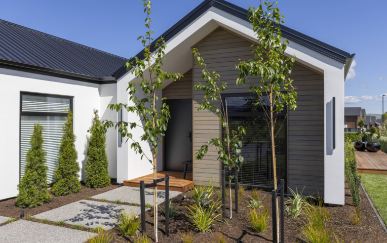 Exterior of home with horizontal cladding in TMT Amba