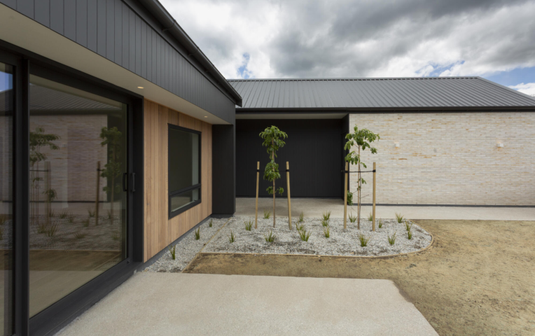 Exterior view of backyard at Jack's Point Queenstown Home