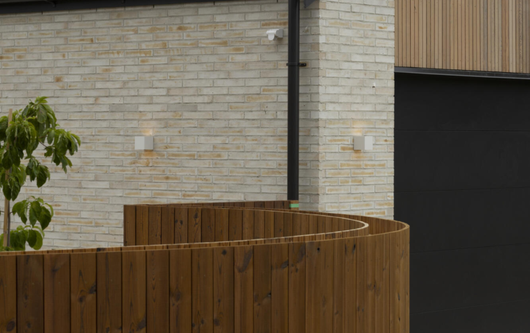 Exterior timber TMT Taiga fence and cladding detail at Jack's Point Queenstown Home