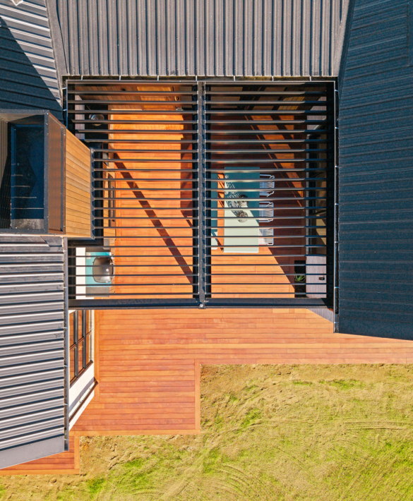 An aerial view of the outdoor deck and entertaining area with TMT Taxon cladding