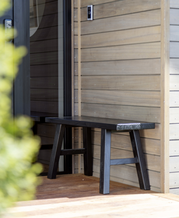 Exterior detail of home with horizontal cladding in TMT Amba