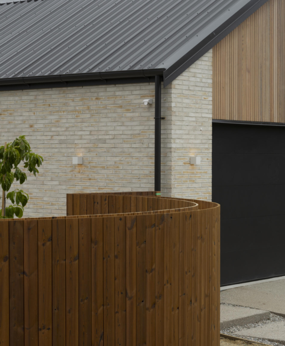 Exterior timber TMT Taiga fence and cladding detail at Jack's Point Queenstown Home