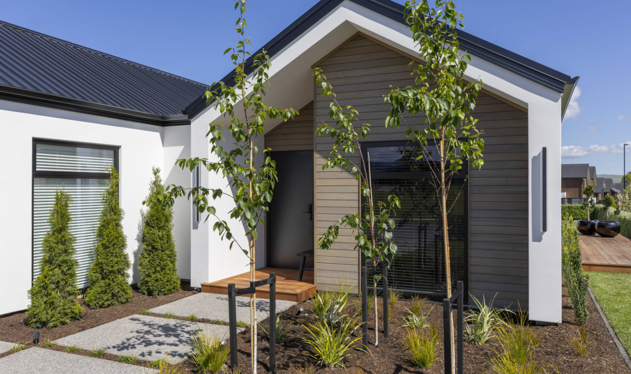 Exterior of home with horizontal cladding in TMT Amba