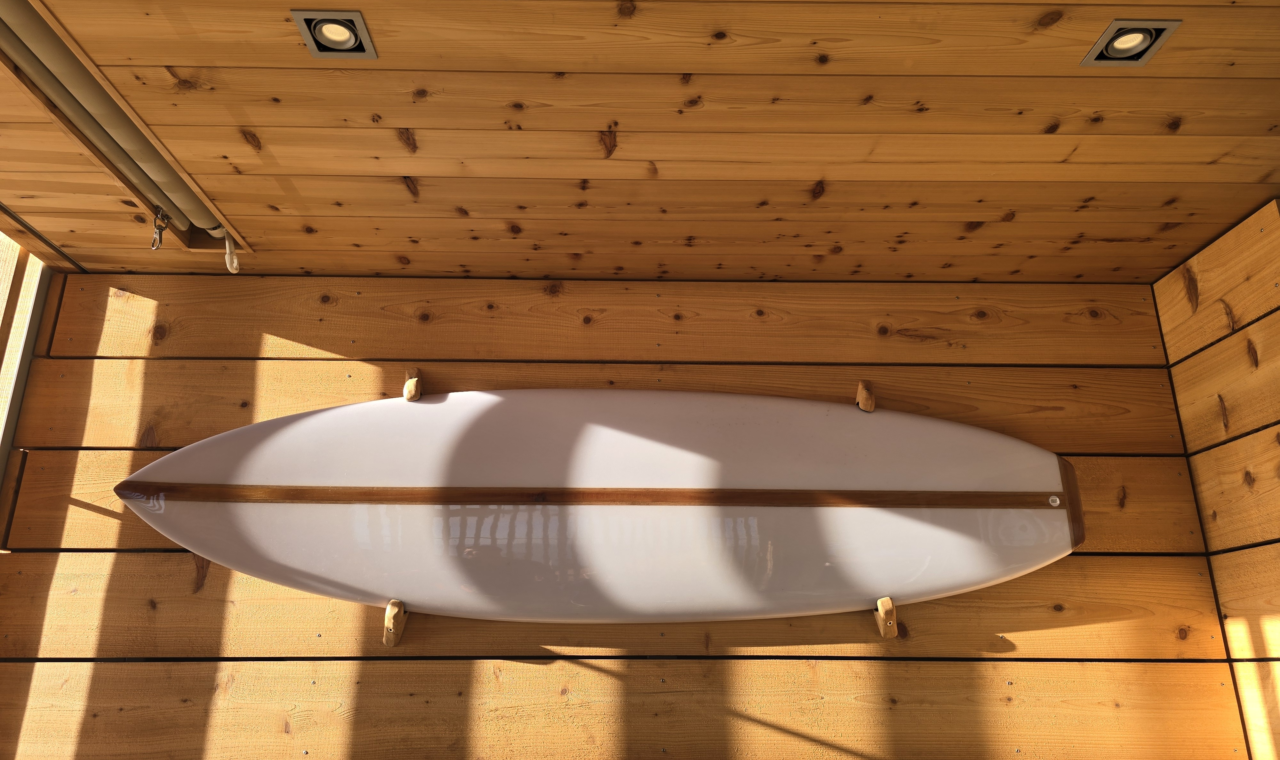 Custom Surfboard incorporating rustic cedar from the build