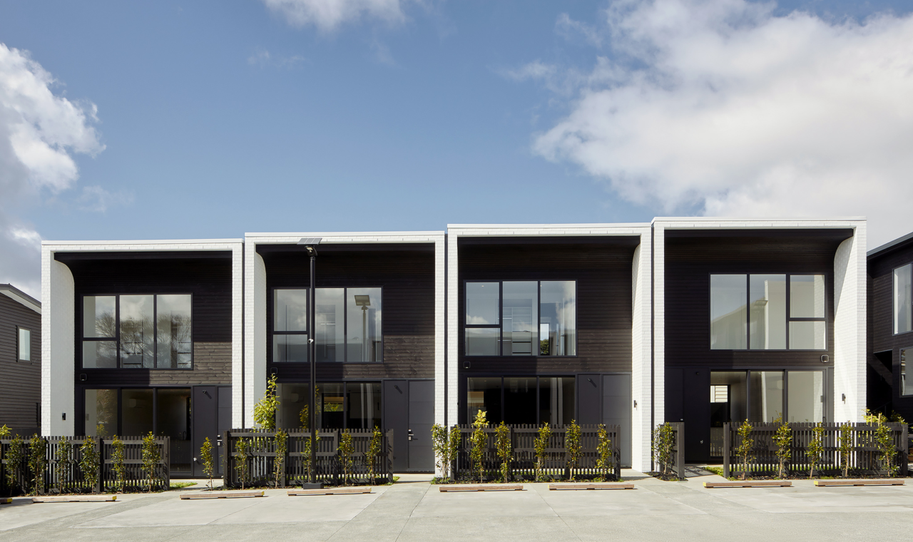 TMT Taiga vertical shiplap cladding coated in JSC Scumble Nightfall on Huia Road Project