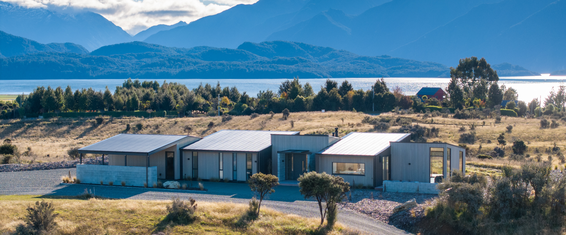 Alaskan Yellow Cedar cladding & Purpleheart decking featured at "Rocky Ridge" home in Te Anau. Designed & Built by Fabric & Te Anau Ltd. Image by Stephen Goodenough Photography.