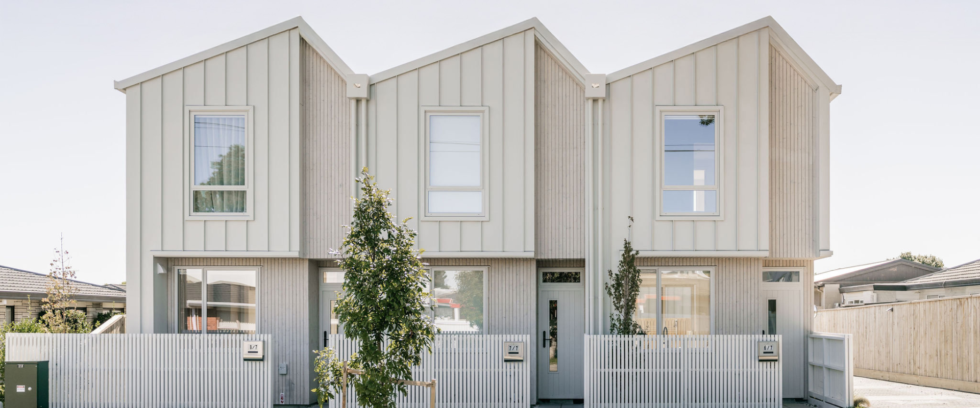 JSC Halcyon TMT Taiga Timber Cladding coated in JSC Scumble Frost 12th Avenue Tauranga Lighthouse Group Townhouses